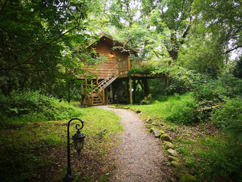 Quirky Accommodation In Ireland: The exterior of the treehouse in Teapot Lane